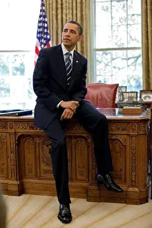 Governmental Prints: President Barack Obama leans against the Resolute Desk in the Oval Office, April, 30, 2010