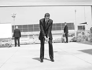 Executive Prints: President Barack Obama practices his golf swing at an outdoor hold prior to an event at the Miguel Contreras Learning