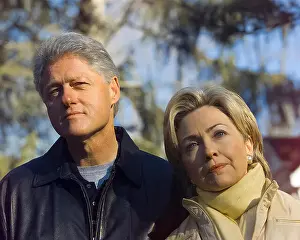Holding Hands Prints: President Clinton and first lady Hillary Rodham Clinton talk to the press in front of their Chappaqua