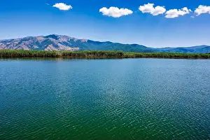 Green Hills Prints: Prespes Lake in Greece with calm waters