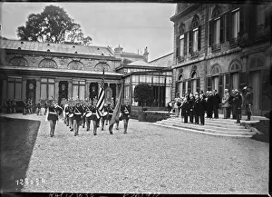 A press photograph records members of the American Legion at the Elysée Palace in Paris in 1927 during an official