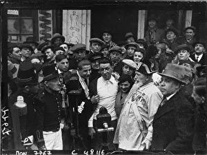 Contest Prints: A press photograph records Roger Jamin being congratulated during the Critérium of newspaper carriers in Montmartre