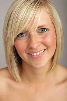 Eyed Prints: Pretty blonde haired young woman looking at camera and smiling
