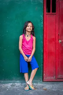 Manila Prints: A pretty young Filipino girl poses and smiles for my camera in the old walled city of Intramuros