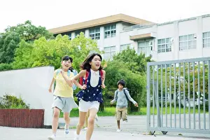 School Bag Prints: Primary schools children running out of the school gate