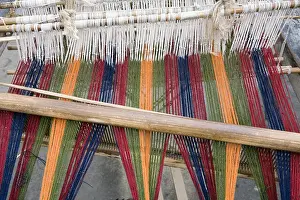 Weaving Prints: Primitive pedal looms are employed by weavers in the Chhume Valley village of Zungney to fashion woolen goods