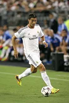Real Madrid Prints: Pro soccer player Cristiano Ronaldo in action with his team Real Madrid