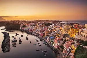 Procida, Italy old town skyline in the Mediterranean in the evening