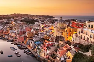 Procida, Italy old town skyline in the Mediterranean in the evening