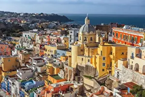 Procida, Italy old town skyline in the Mediterranean Sea during dusk