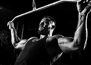 Bodybuilding Prints: Professional athlete performs an exercise in the gym