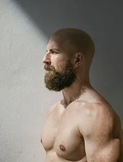 Endurance Prints: Profile of bald muscular man