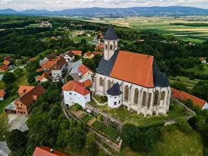 Ptujska Gora Prints: Ptujska Gora Church on Hill Top in Slovenia Countrtyside. Drone Scenic View
