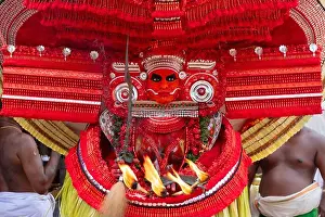South India Prints: The Puliyoor Kali Theyyam is a manifestation of the Goddess Durga who protects the community in a Hindu Religious