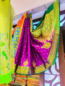 Saree Prints: Purple Color Silk Saree Handing On Store Stock image