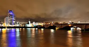 Fulham Prints: Putney Bridge at night, seen from across the River Thames in London