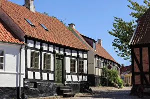 Timbered Prints: Quaint old houses on narrow cobbled street of Overgade