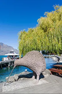 Quayside Prints: Queenstown South Island new zealand Giant Kiwi statue by the side of Lake wakatipu Queenstown steamer quay queenstown