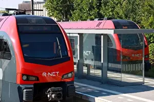 Flirt Prints: Two R-NET commuter trains are waiting on station of Boskoop between Gouda and Alphen aan den Rijn in the Netherlands