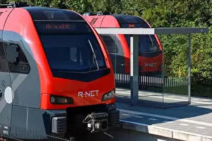 Flirt Prints: Two R-NET commuter trains are waiting on station of Boskoop between Gouda and Alphen aan den Rijn in the Netherlands