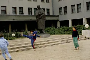 Serbia Prints: radovan karadzic boys playing football outside communist party hq sarajevo sept 1990