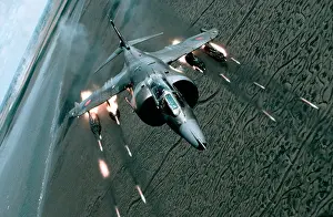 Professionals Prints: RAF Harrier firing SNEB rockets
