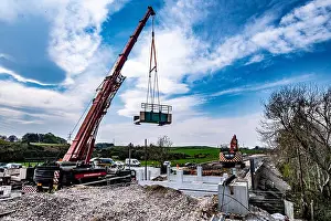 Lifted Prints: Rail bridge being lifted into place