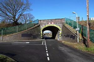 Archway Prints: A Rail over road bridge with a 'T' junction showing warning signs for a height restriction