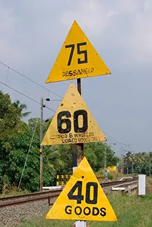 Railway Line Prints: Railway sign board regarding speed limit for various Trains including passenger