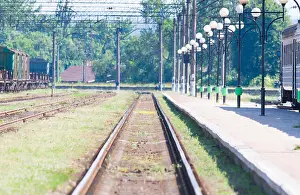 Business Architecture Prints: railway tracks a train station in day. Ukraine