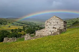 Grey Sky Prints: Rainbow over traditional stone barn in the Swaledale valley