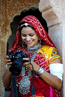 Rajasthani Prints: Rajasthani lady looking at camera ; Rajasthan ; India MR#769C