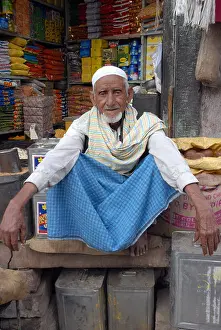Headwear Prints: Rajasthani Muslim Shopkeeper looking at camera