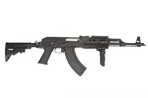 Trigger Prints: Rare first model AK - 47 assault rifle with modern tactical accessories isolated on white
