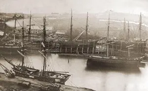 Repairing Prints: A rare & unusual old photograph showing sailing ships being built or repaired at the Whitehall shipyard on the river