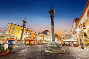 Ravenna, Italy at Piazza del Popolo and landmark towers at dusk
