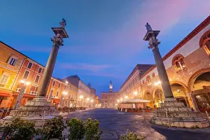 Ravenna, Italy at Piazza del Popolo with the landmark Venetian columns at dusk