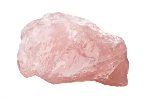 Quartz Prints: Raw, uncut rose quartz crystal isolated on white background