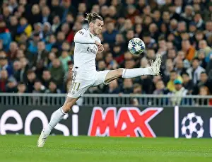 Real Madrid Prints: Real Madrid CF's Gareth Bale seen in action during the UEFA Champions League match