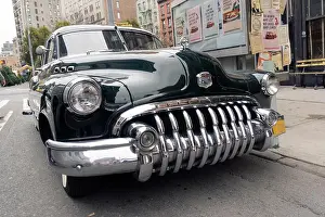 Havana Prints: Rear view of a classic vintage American car in the street of NYC