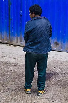 Backs Prints: Rear View Of A Man Peeing On Wall In Street