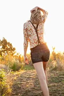 Cape Town Prints: Rear view of a woman walking on a trail