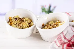 Cinnamon Prints: Recipe step by step crumble with fruits 0 in a ceramic ramekin with red flowers on white in background