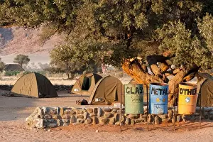 Campsite Prints: Recycling bins for glass, metal and other materials and tents at Sesriem campsite