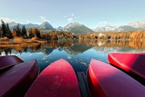 Images Dated 10th October 2018: Red boats on Strbske Pleso lake. Location: High Tatras National Park, Slovakia