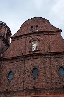 Katowice Prints: Red brick church in Katowice, Poland shows curvilinear gable