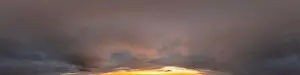 Red burning sunset sky panorama with Cumulus clouds