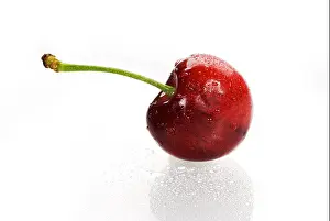 Wet White Prints: Red cherry with stem isolated on white background