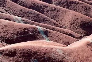 Desolate Prints: Red clay badlands dunes background texture
