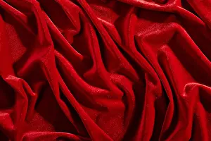 Bend Prints: Red color velvet textiles for background or texture, wrinkled and shadows
